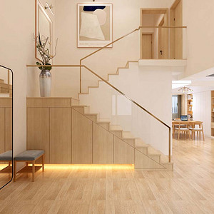 进门正对通往二楼的楼梯,踏步选用和地板相近的木质踏步,透明玻璃扶手
